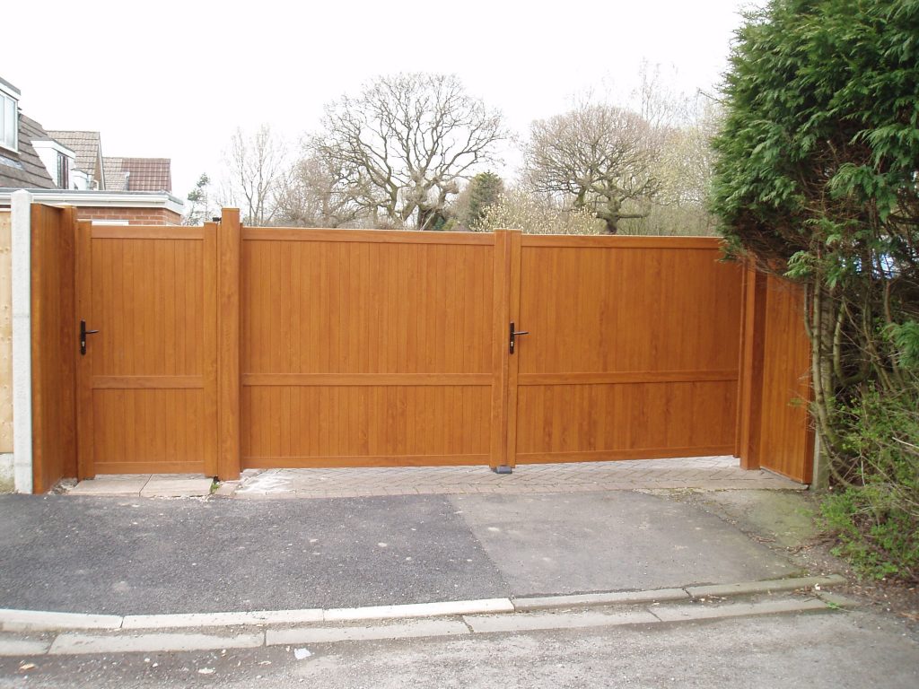Double Single Executive PVCu Gates with Posts in Golden Oak Broughton Astley